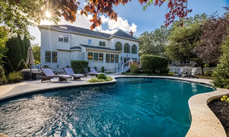 Backyard pool and spa and patio of the Ashburn luxury real estate property, sold by top listing agent Jean Garrell and the Garrell Group best Ashburn Realtors.