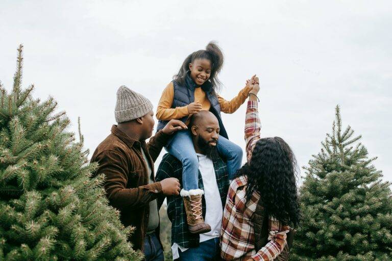 A family goes shopping for Christmas trees at a local farm in Loudoun County for the holidays 2024