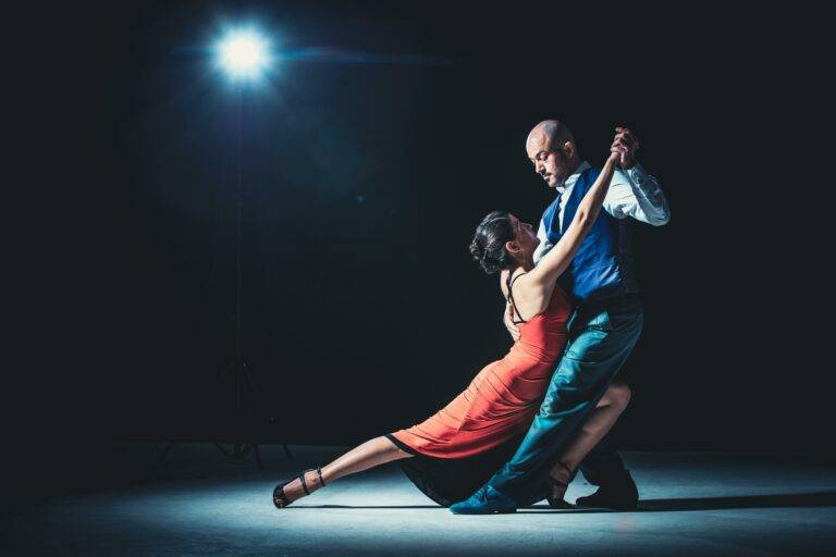 A man and a woman dance together, representing the activities and things to do and events for families this winter in Leesburg